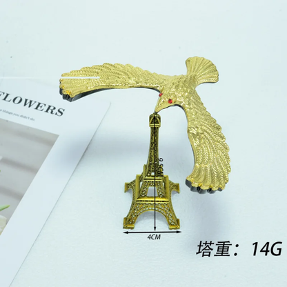 Levitating eagle on effiel tower